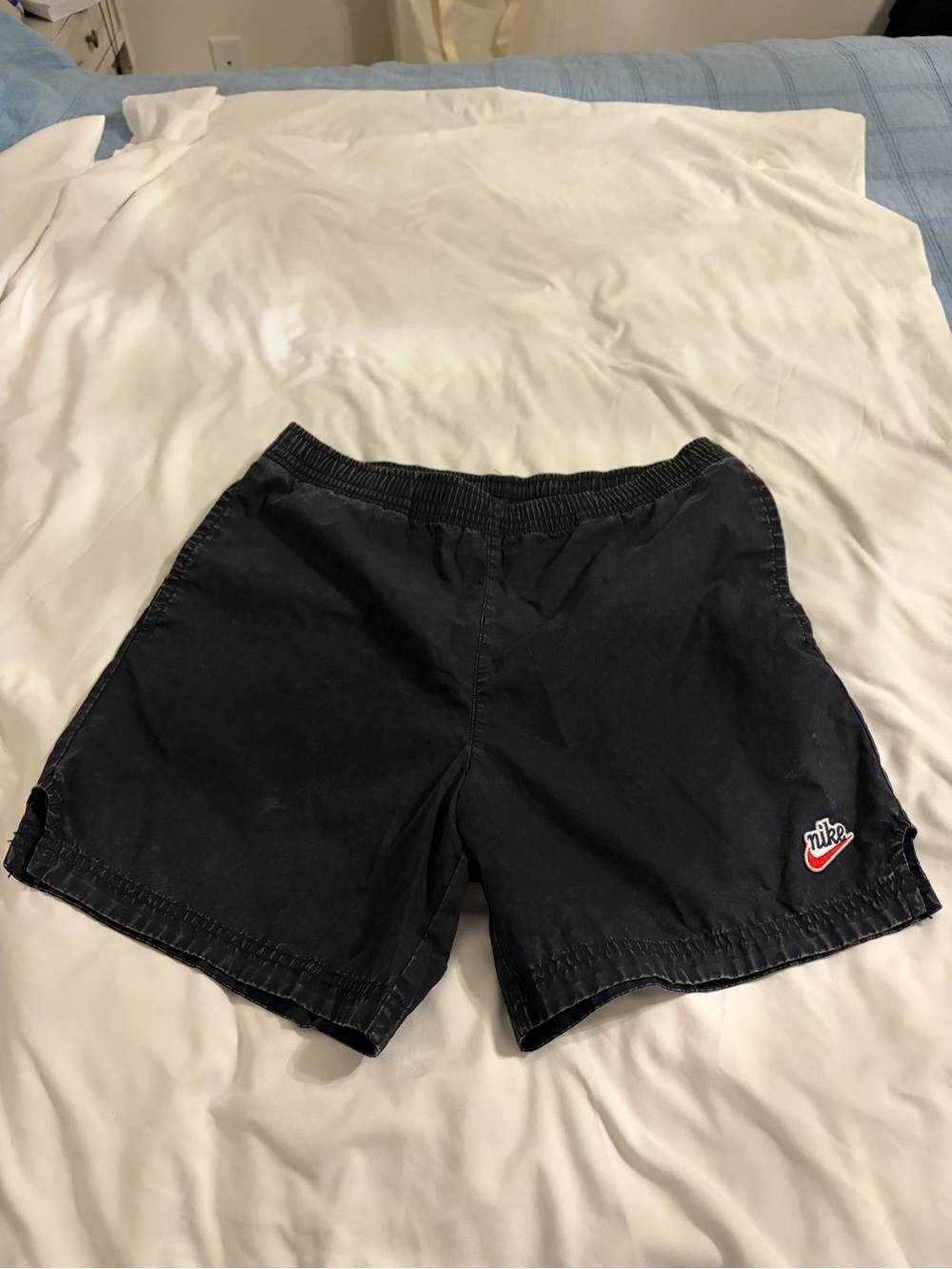 Nike Navy Athletic Shorts with White Drawstring and White Swoosh Tag